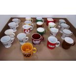 A collection of 21 ceramic promotional m