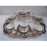 A Royal Crown Derby cabaret tea set on an oval tray with shaped rim 45.5 x 35, teapot, milk jug,