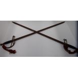 Two ornamental swords with coiled wire h