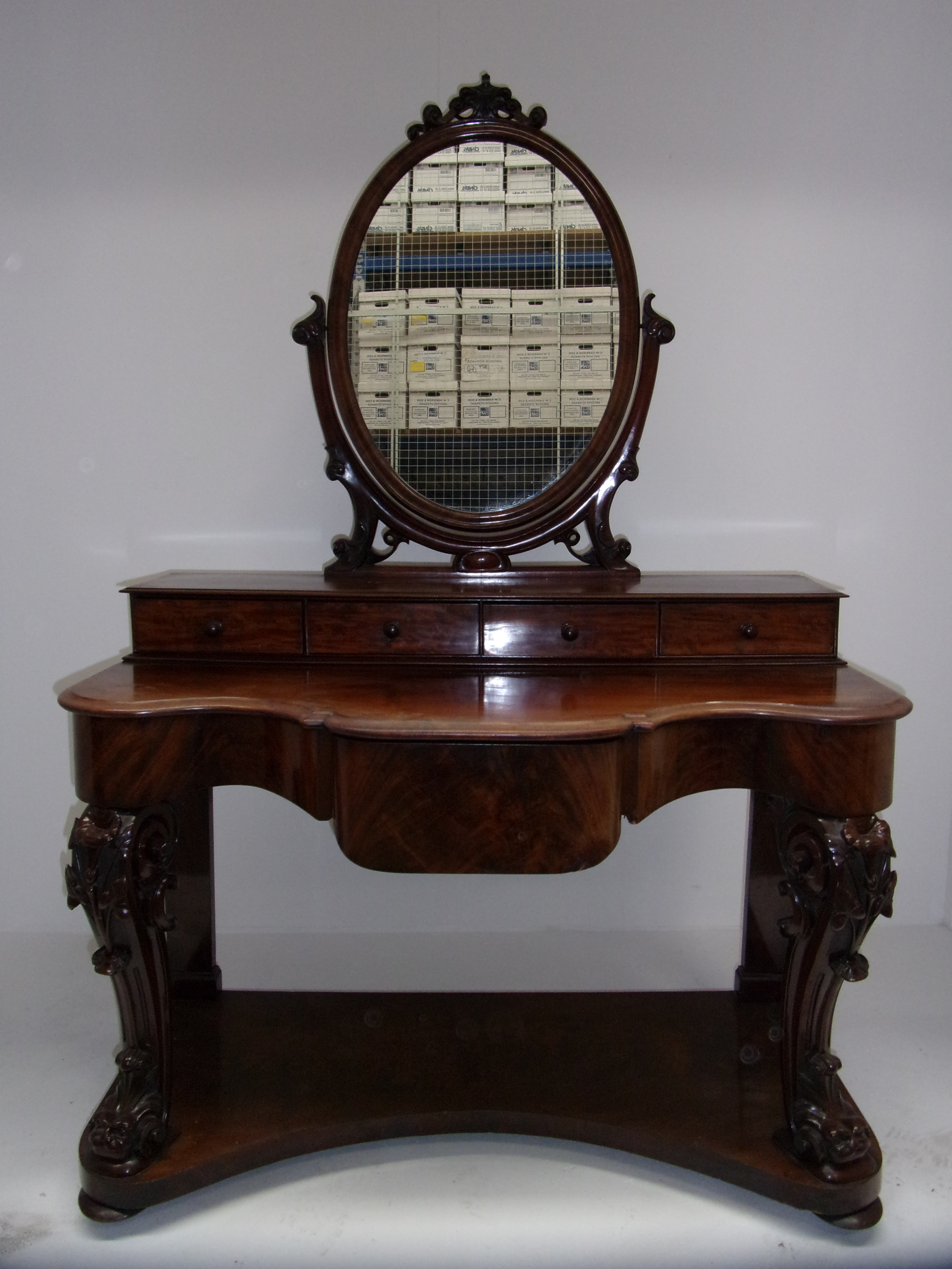 A Victorian mahogany Duchess dressing table with oval mirror over four drawers, shaped front and - Image 3 of 4