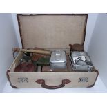 Two rifle cleaning kits, field stove, me