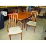 a 1960's teak extending dining table 100 x 200cm extended and 6 matching dining chairs (2 carvers)