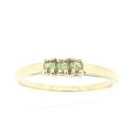 9ct yellow gold green garnet three stone ring 1.