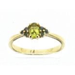 9ct yellow gold chrysoberyl / emerald ring 2.