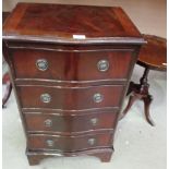 A mahogany miniature 4 drawer serpentine front chest of drawers 50cm