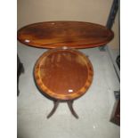 A mahogany oval side table and another with pie crust edging (2)
