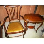 A mahogany elbow chair and a mahogany oval side table (2)