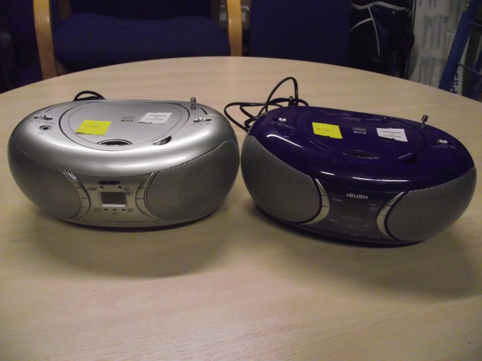 A SILVER PLUS A PURPLE BUSH PORTABLE CD/MP3 BOOMBOXES WITH FM RADIO CBB193MP3  (#23)