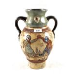 A French Dubois pottery vase with moulded figural decoration, height 14''