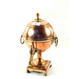 A Regency twin handled Copper and Brass samovar of small proportions with an applied Silver plaque