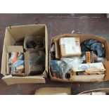 Two boxes of Ford parts including engine