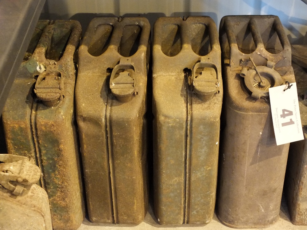 Four jerry cans including one USA exampl