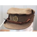 A WWII (dated 1942) ATS hat with badge