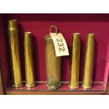 Four WWII dated shell cases with a 1916