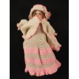 An Armand Marseille dress doll (damaged