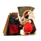 A box of various costume dolls