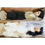 A pair of large Doll Art Co porcelain dr