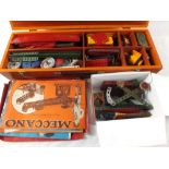 A wood box and various Meccano