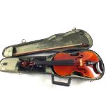 A cased violin and bow, paper label "And