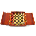 A Mahogany cased travelling chess set