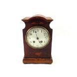 An Edwardian inlaid Mahogany striking mantel clock