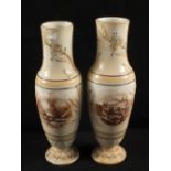 A pair of Bairnsfather potter vases with "Tommy" caricature to bases,