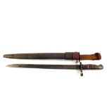 A Remington 1917 bayonet with scabbard and leather frog