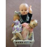 A dolls cot,