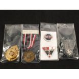 A collection of five German (PATTERN) awards including a War Merit medal