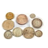 An 1887 double florin, a 1935 crown, a 1936 half crown, a 1930 florin, a 1936 shilling,