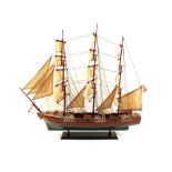 A Hannah wooden galleon and a two masted yacht