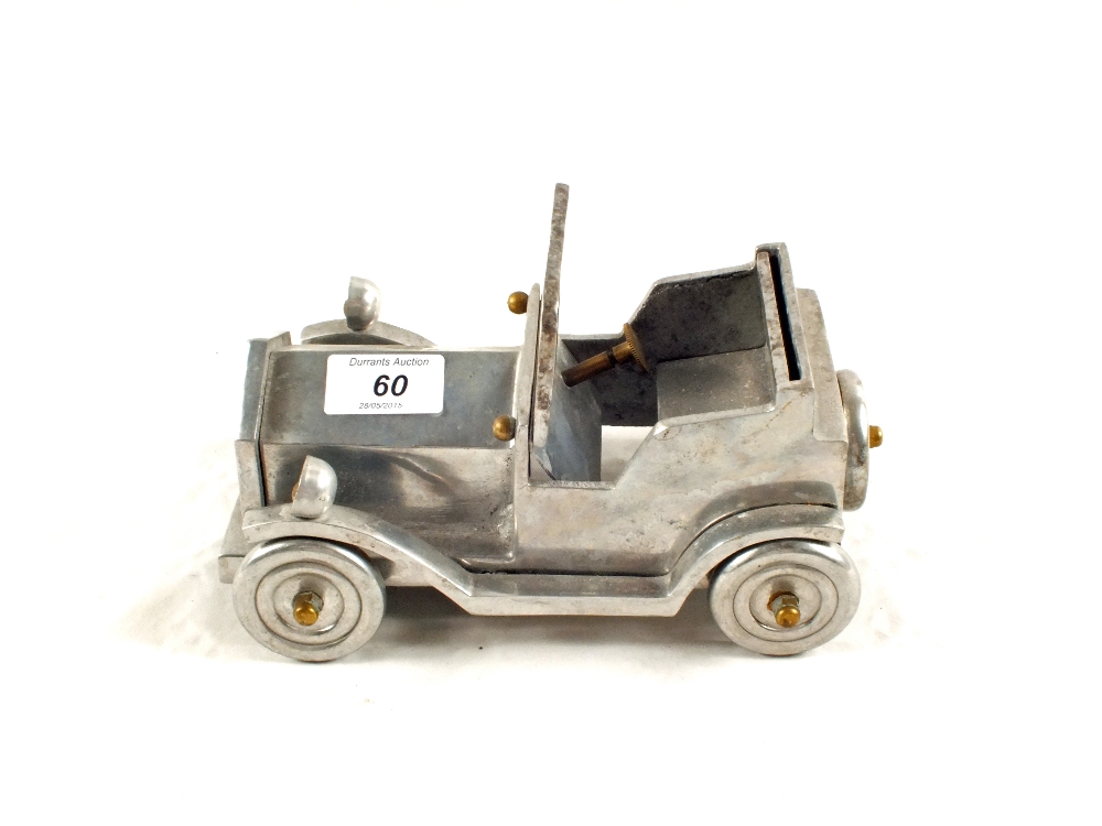 An aluminium model of a vintage car