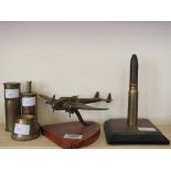 Five items of "Trench Art" including lighters and a plane