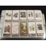 An album of sets and part sets of cigarette cards