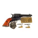 A replica Colt 45 with Brass name plaque and "dummy rounds" mounting brackets,