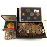 A cash tin of GB and foreign coins including two coin sets and three Fiji banknotes