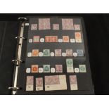 Two albums of British stamps including mint Victorian and other issues and a strip of three two