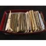 A box of postcards including military subjects and Tucks record cards