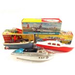 Three boxed model boats, Penguin clockwork drifter,