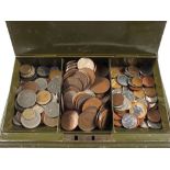 A cash tin of world coins and banknotes