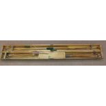A cased set of three competition long bows and arrows and accessories by Aldred of London,