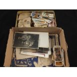 A stamp album, various postcards,