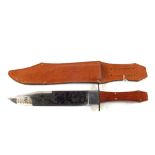 A John Wayne commemorative Bowie knife with coffin scales,