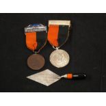 A Silver Hoover presentation trowel 1935 and 1933 and 1935 medallions