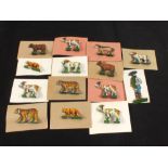 Thirteen tin plate German animals and a shepherd