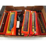 Nine boxed Hornby coaches and nine unboxed Hornby coaches and trucks