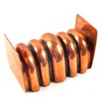A Victorian Copper jelly mould in the form of a fluted tunnel,