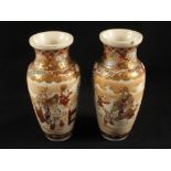 A pair of Satsuma figure decorated vases