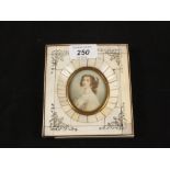 An oval miniature of head and shoulders of a lady in part Ivory frame