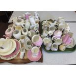 A large quantity of souvenir china (two trays),